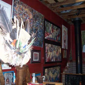 The art-covered walls of the Outsider Cafe.